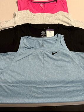 Nike Women’s Light Blue Athletic Dri-FIT Tank Top with Black Swoosh
